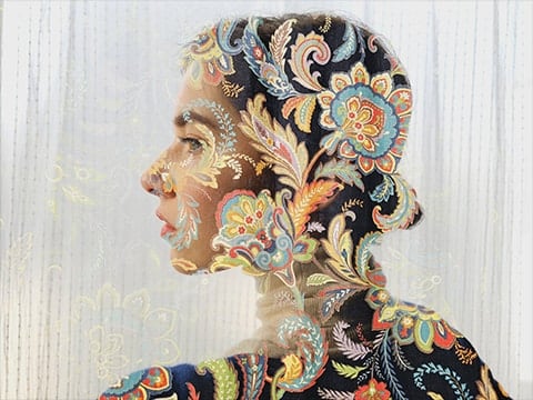 Using Expert Raw's Multiple exposure tool, a colorful fabric pattern is layered on top of a woman's silhouette. The photo was taken with Galaxy S23 Ultra using wide mode with an aperture of F1.7.