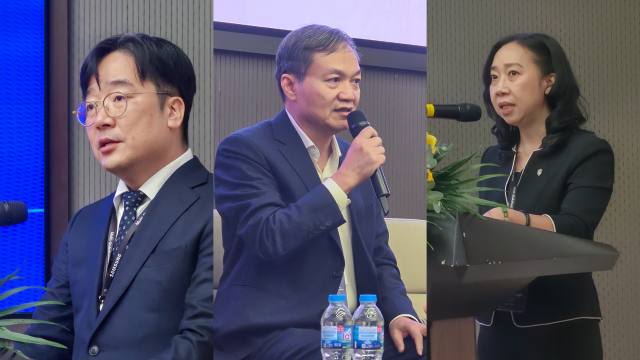Jiho Cha of Samsung Vietnam, Dang Quang Khoi of An Lap, and Nguyen Ngoc Diep of Vina Technology speak during the Smart Factory session.