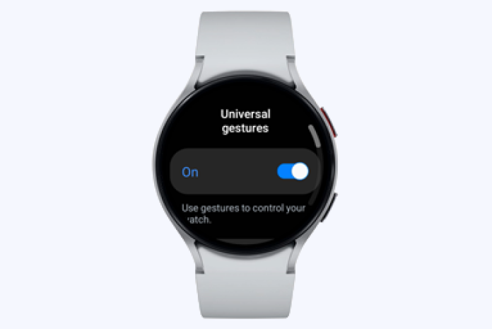 A smartwatch screen showing the Universal gestures feature set to 'On.'