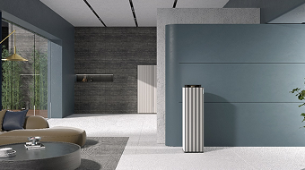 Infinite AI Air Purifier featuring a vertical striped design, placed in a modern living room.